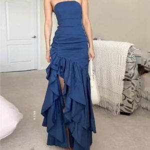 Strapless solid colored slit ruffle dress